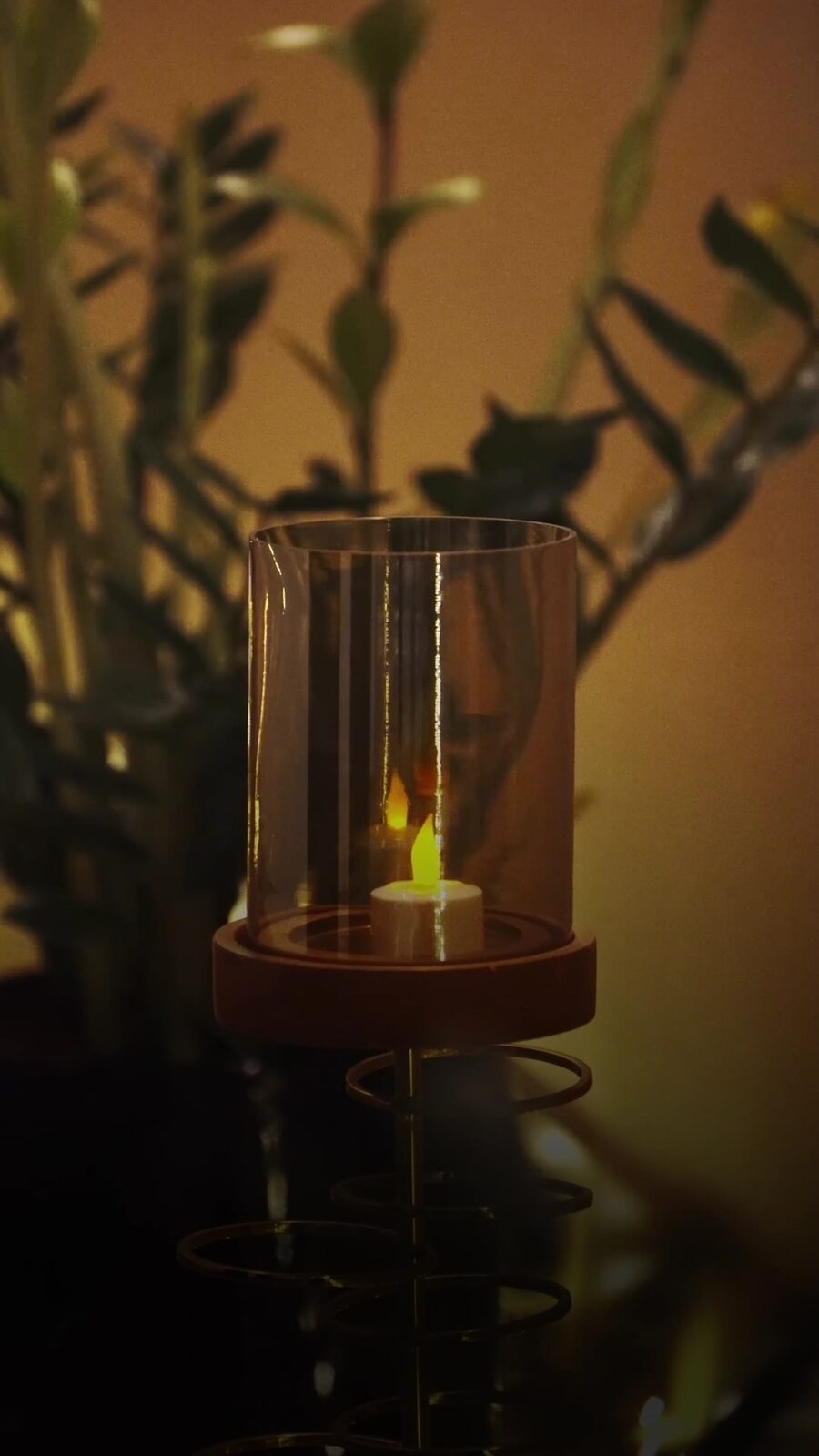 Candlelight and greenery in a Shambala treatment room